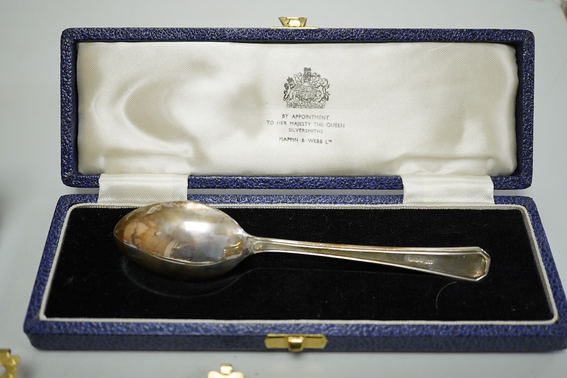 A Portuguese white metal 916 standard circular box and cover, retailed by Joalharia Do Carmo, diameter 94mm, together with cased set of six silver plated coffee spoons, a cased silver teaspoons, a Victorian silver christ